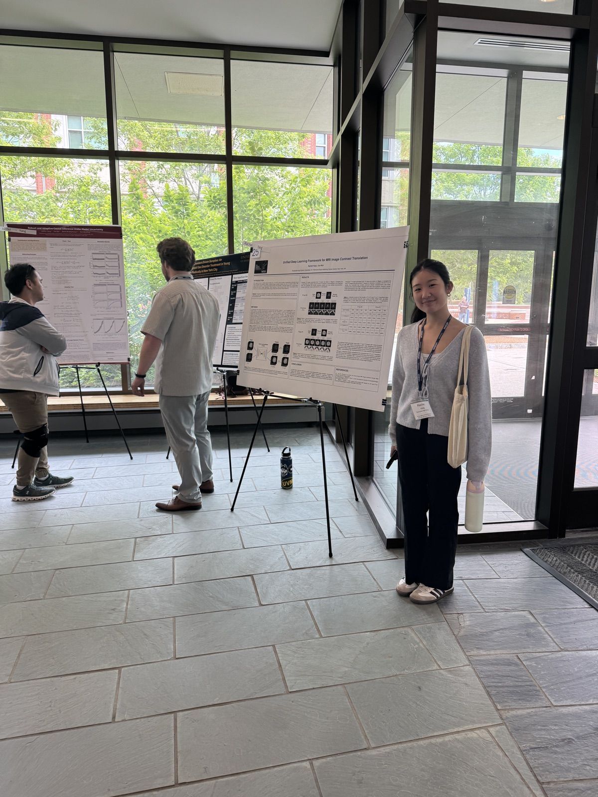 Rachel at her poster during the NESS poster session